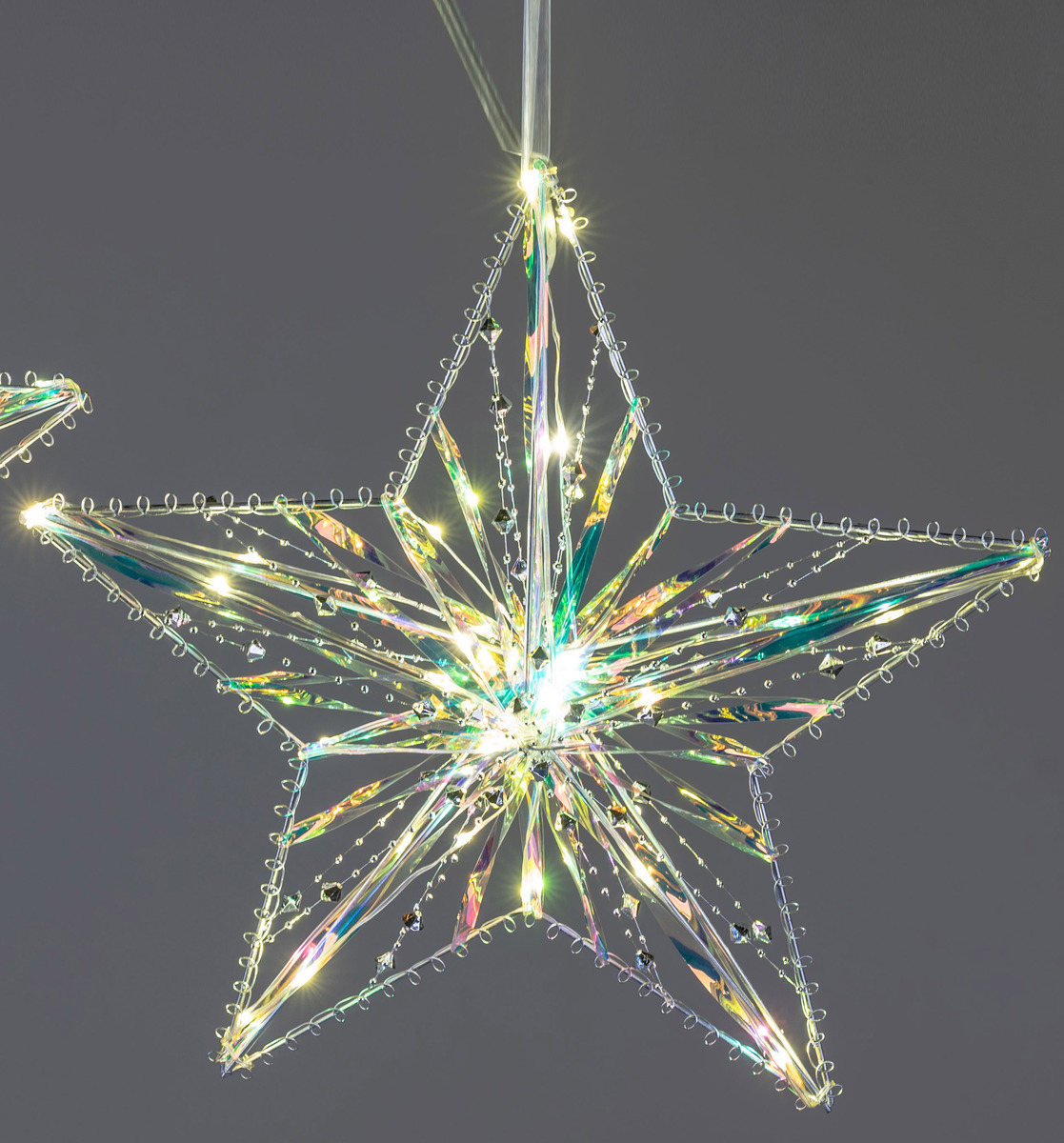 3D-Stern-Hänger mit 15 LED-Lichtern, 25 cm – Silbernes Metall mit schimmernden Kunststoffbändern